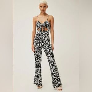 Lita by Ciara open front, tie jumpsuit .